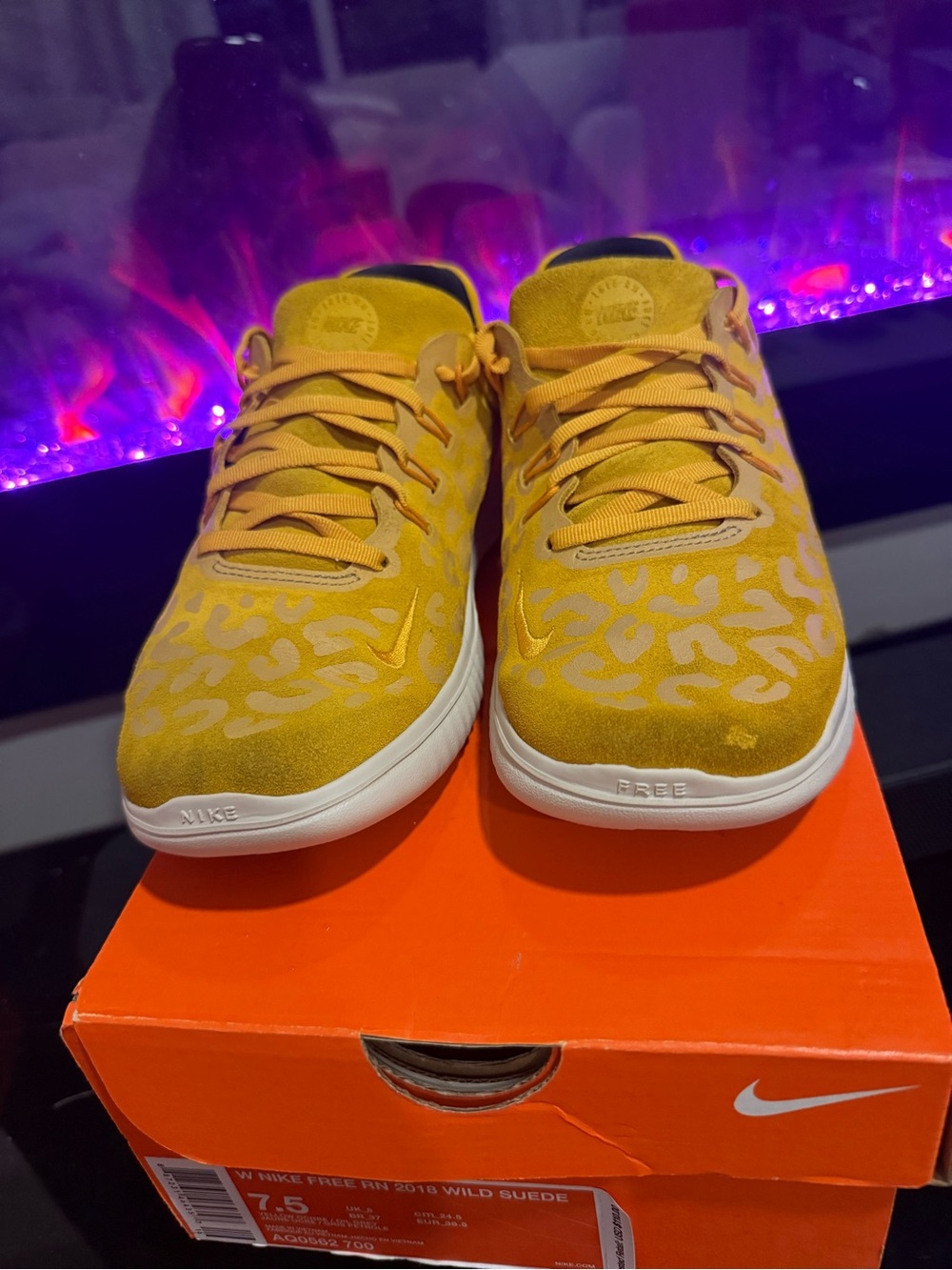 Nike Women’s Yellow Leopard-Print Free RN Sneakers